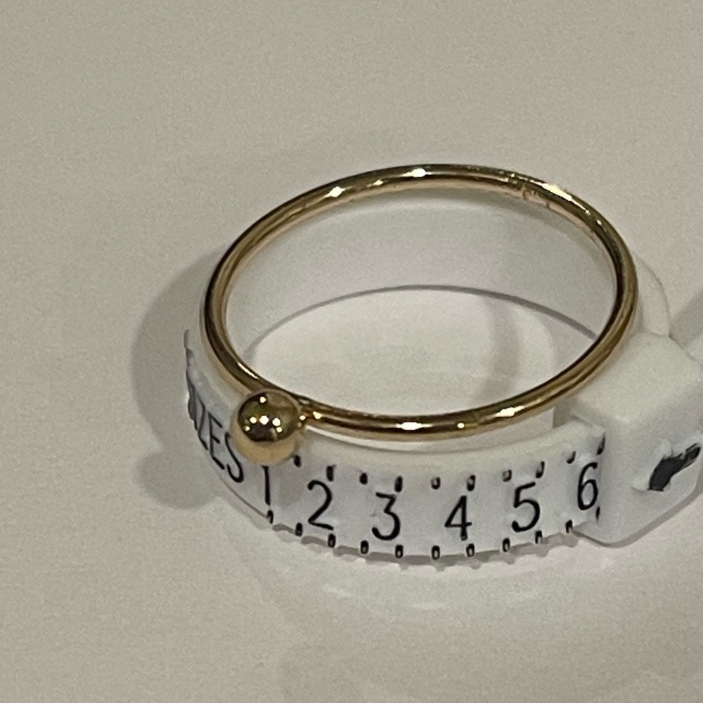 Gold toned ball stone ring​​​​​​​